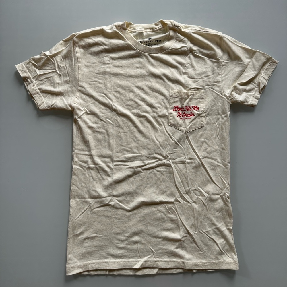 Women's Cream T-Shirt “Don’t Tell Me to Smile”